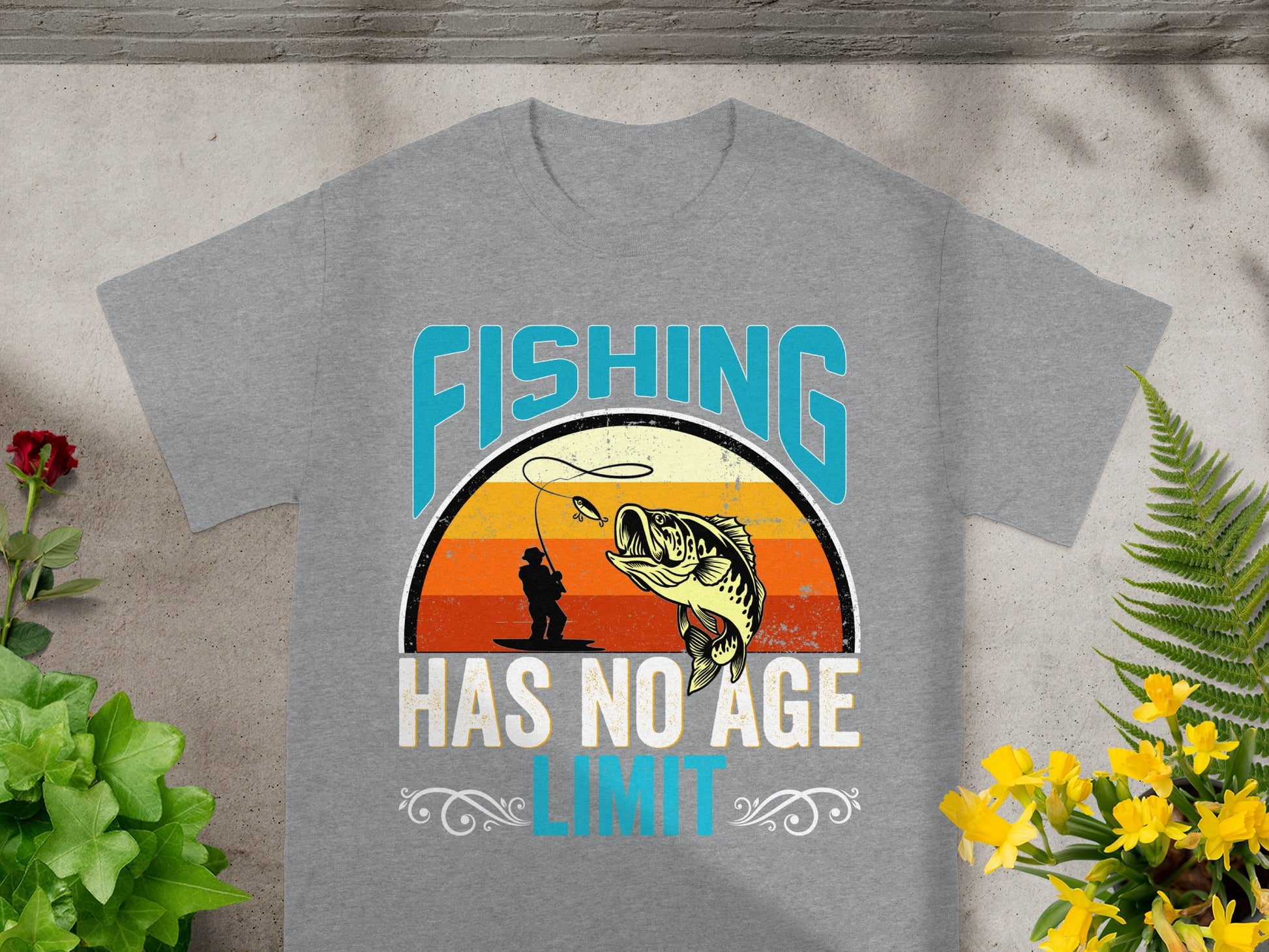 Gray t-shirt with text "FISHING HAS NO AGE LIMIT" and fishing graphic.