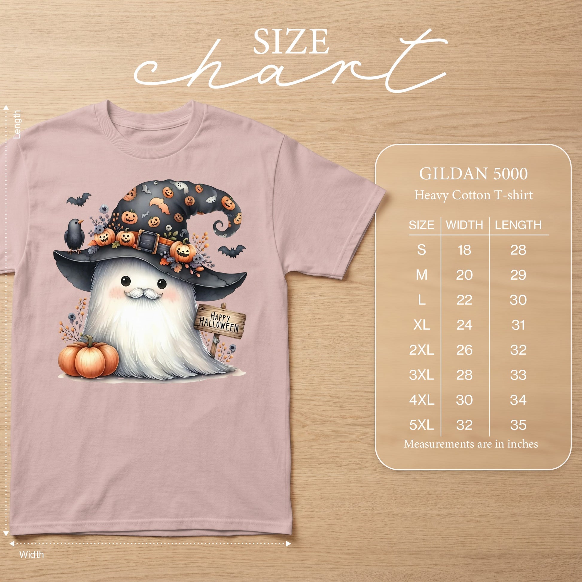 Pink t-shirt with a ghost wearing a witch hat with pumpkins and bats, with size chart.