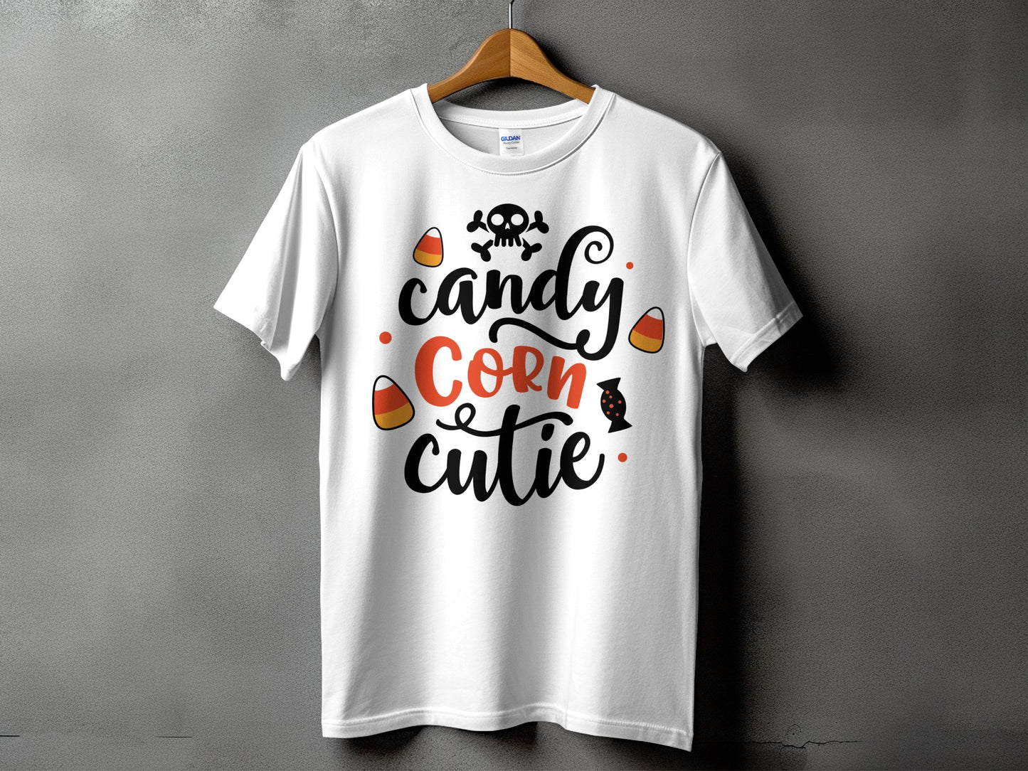 White t-shirt with "candy Corn cutie" text, skull, and candy corn graphics.
