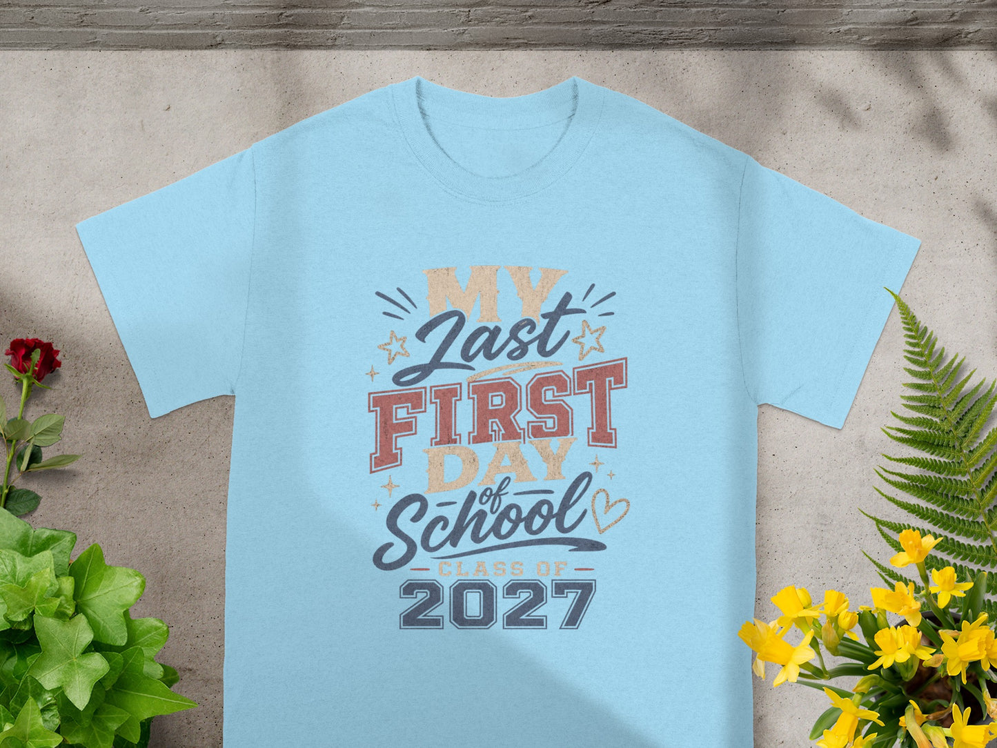 Light blue t-shirt with "My Last First Day of School Class of 2027" graphic.