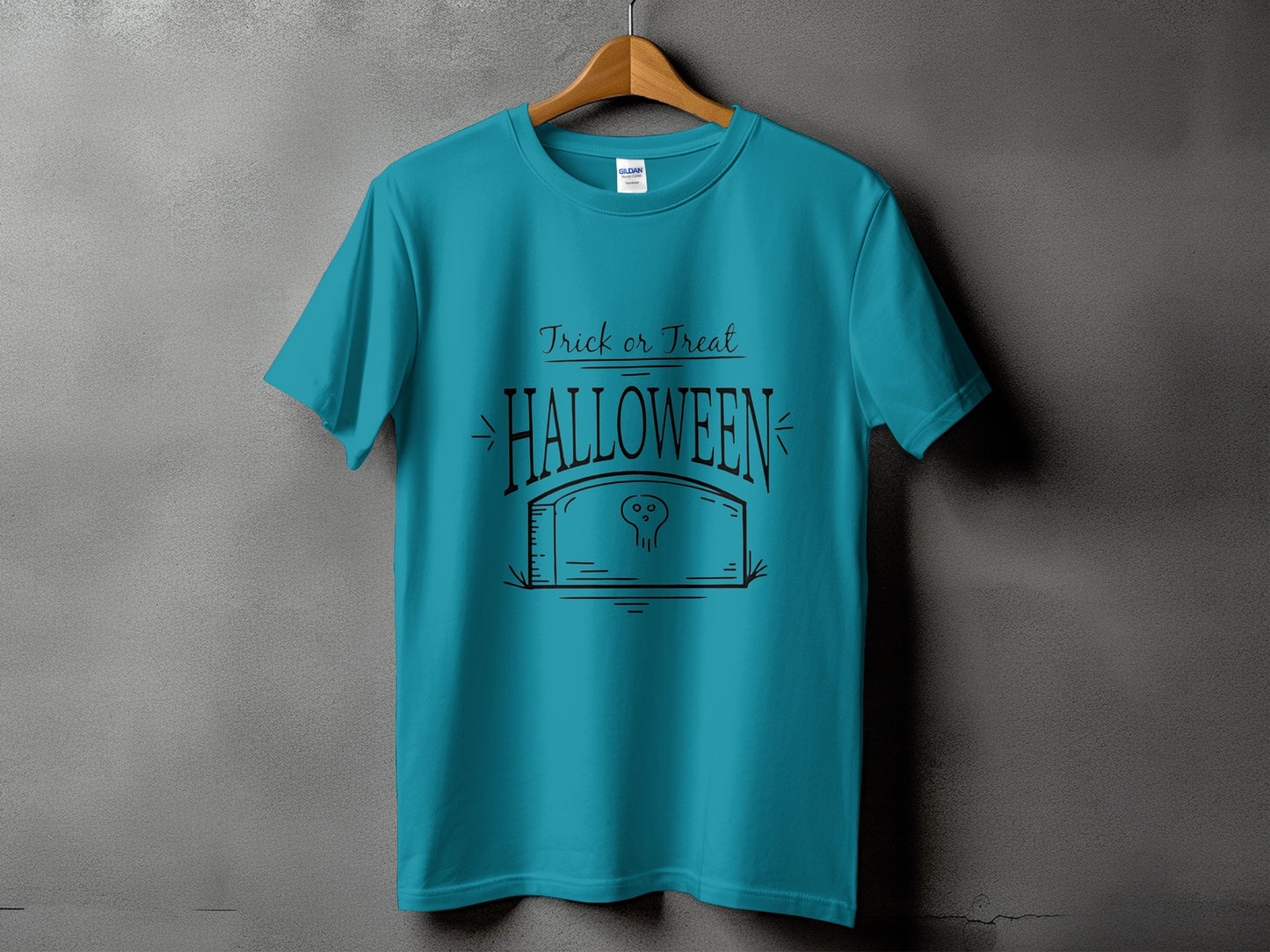 Teal t-shirt with "Trick or Treat Halloween" graphic and a tombstone design.