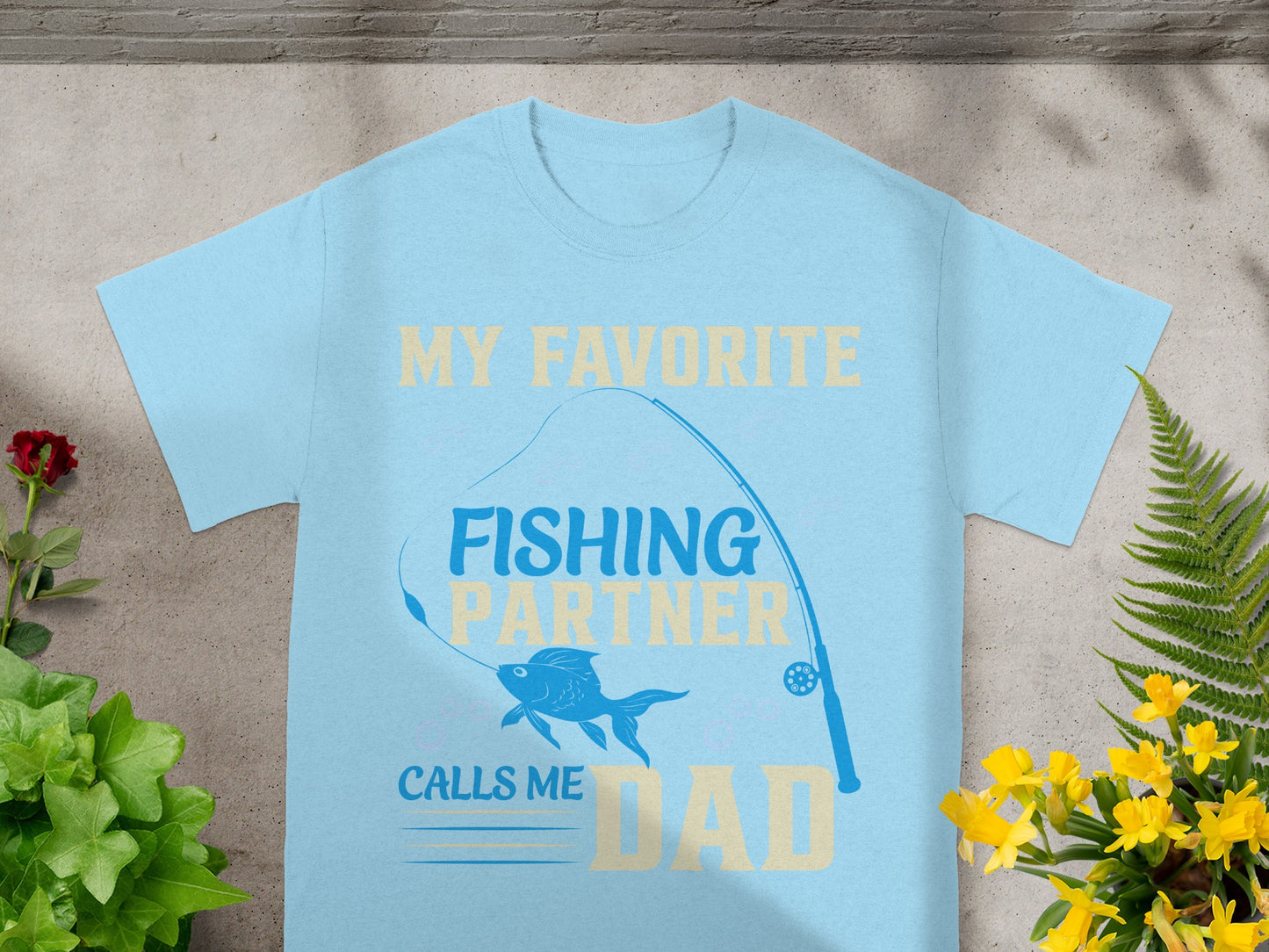 Light blue t-shirt with "My Favorite Fishing Partner Calls Me Dad" text.