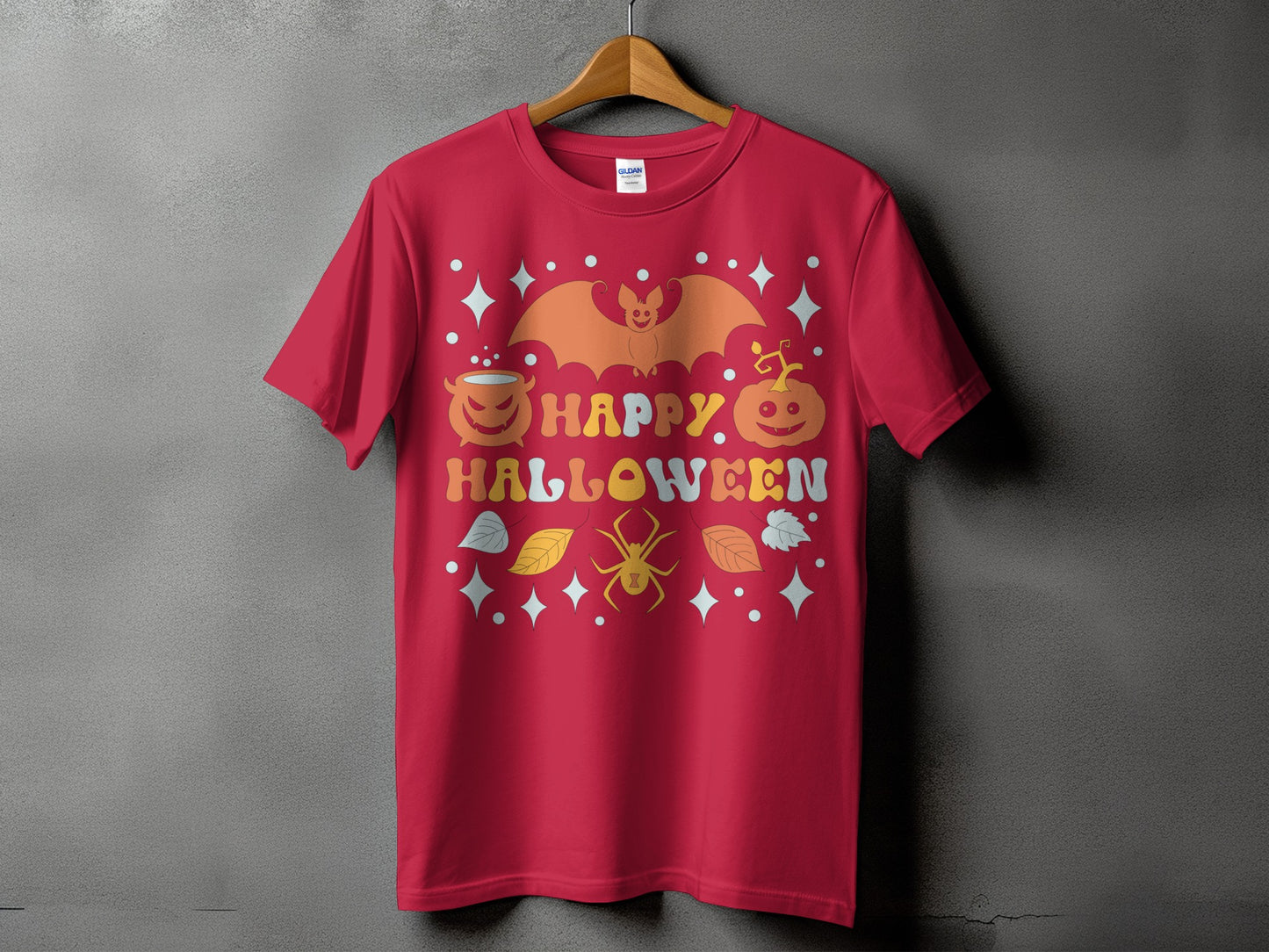 Red t-shirt with "Happy Halloween" text and cartoon bat, pumpkin, spider, and stars.