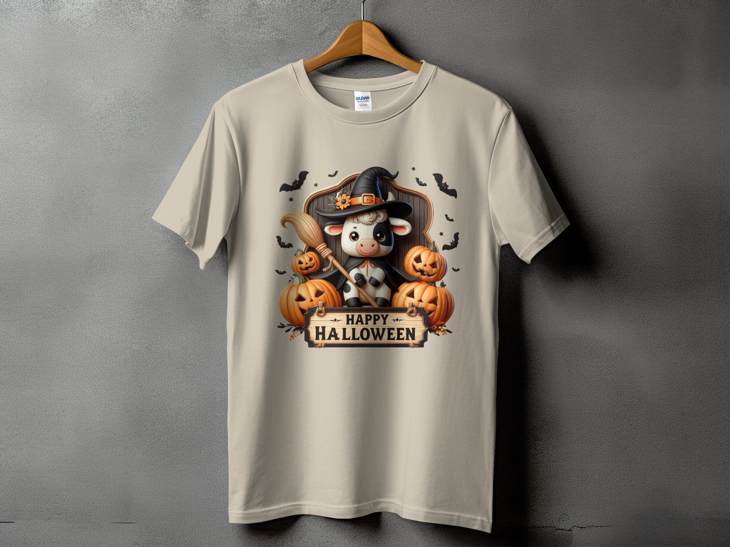 Cow wearing witch hat with pumpkins and "Happy Halloween" text.
