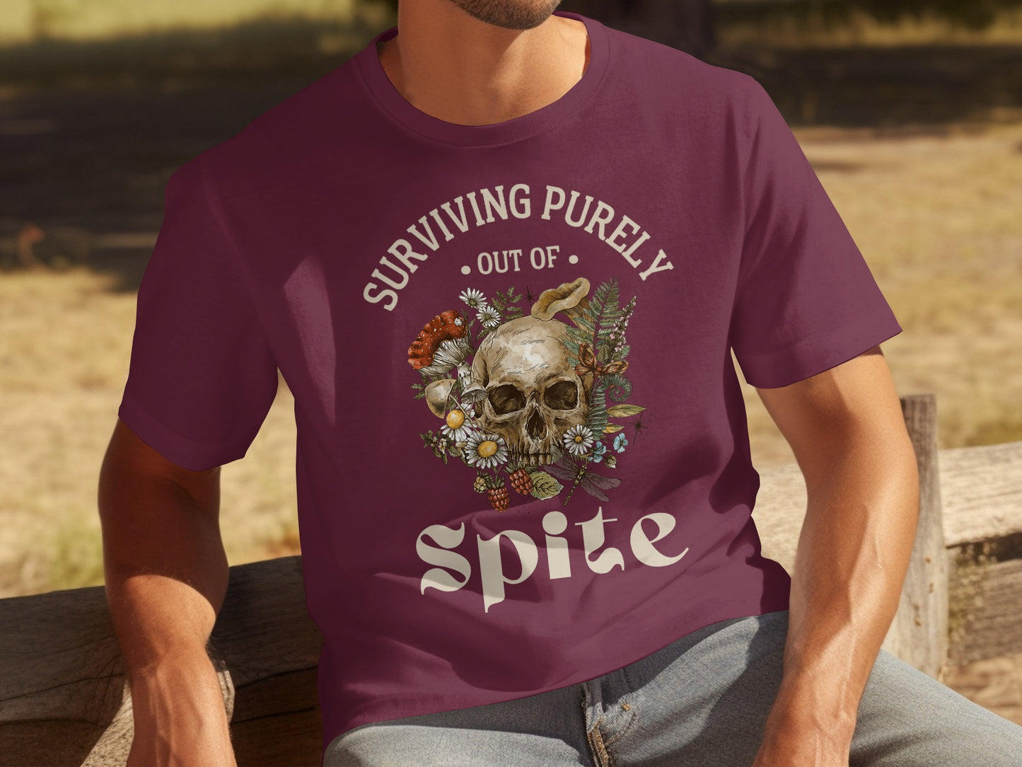 Surviving Purely Out of Spite Skull Graphic Tee