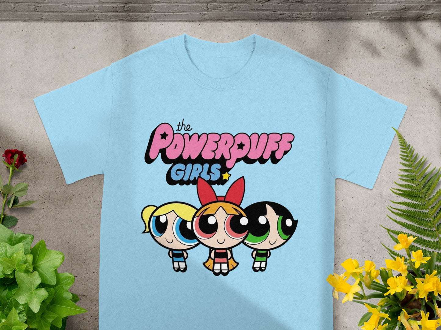 Light blue t-shirt with The Powerpuff Girls graphic.