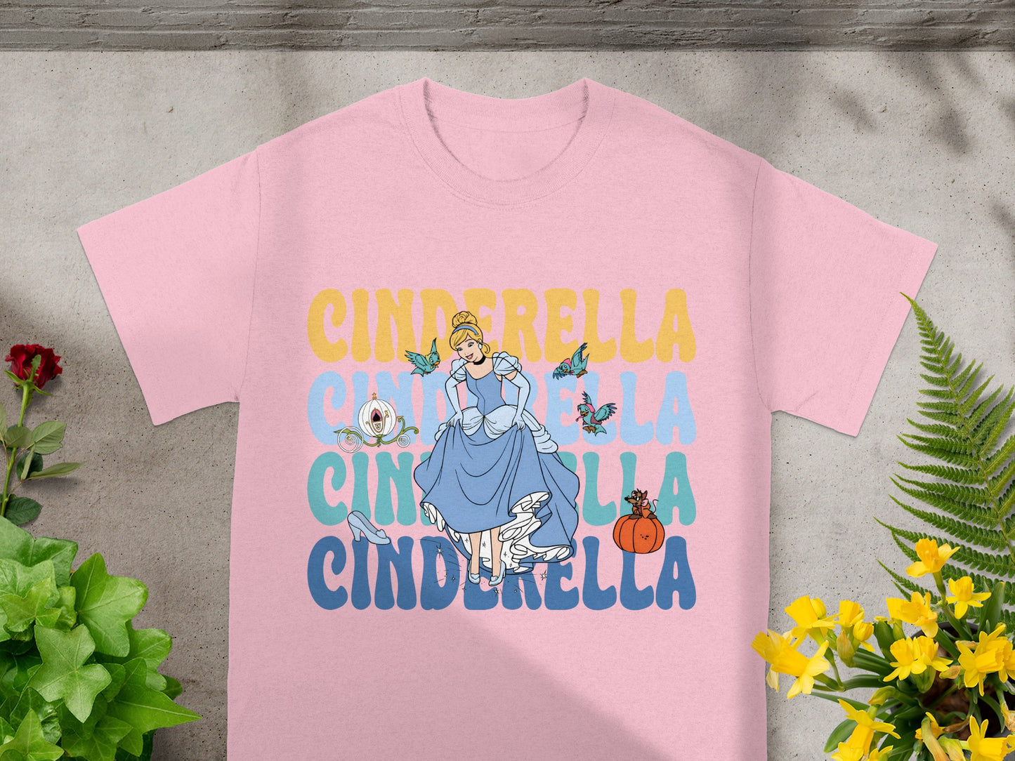 Pink t-shirt with Cinderella graphic and butterflies.