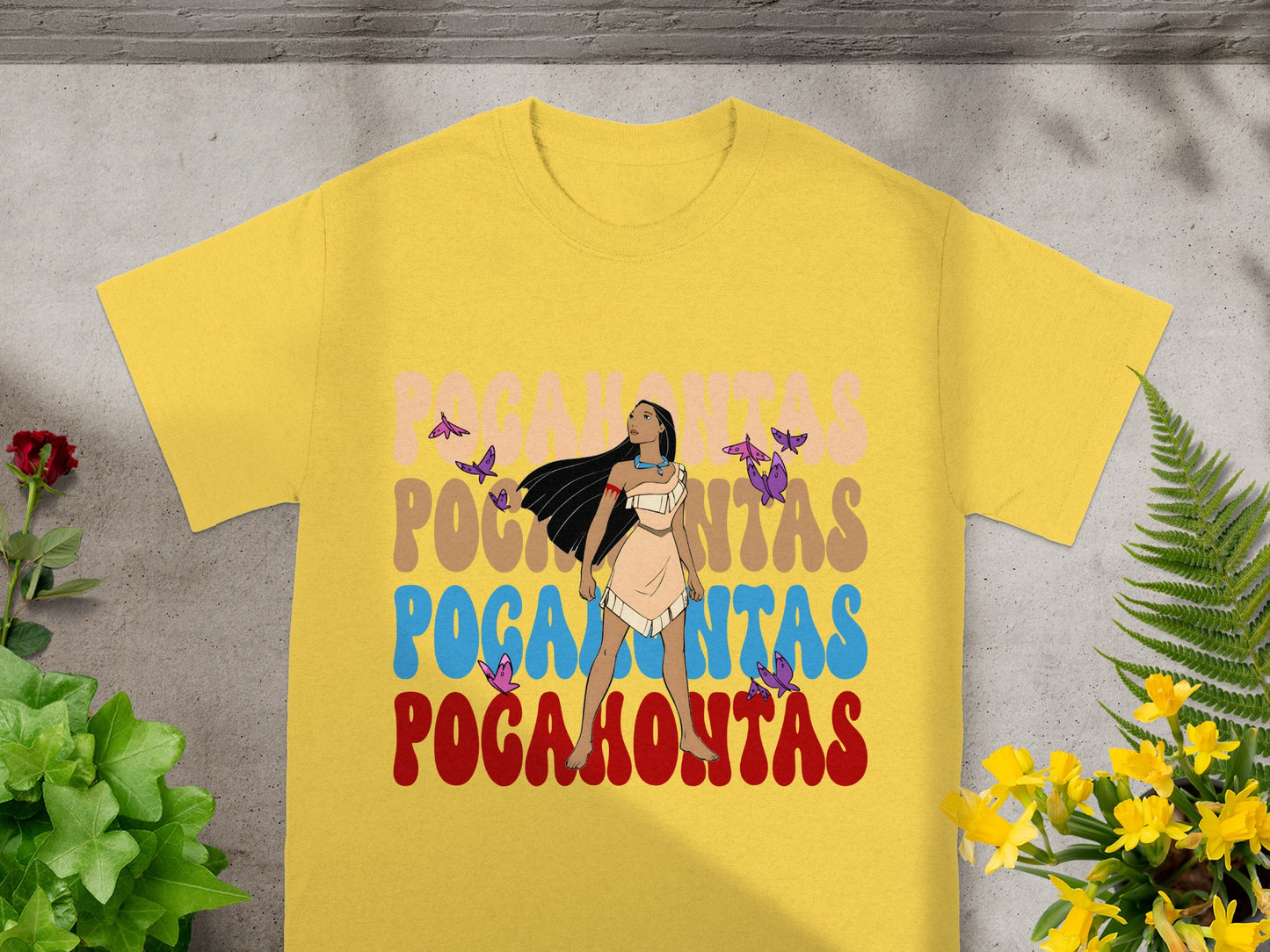 Yellow t-shirt with "Pocahontas" text and a graphic of Pocahontas.
