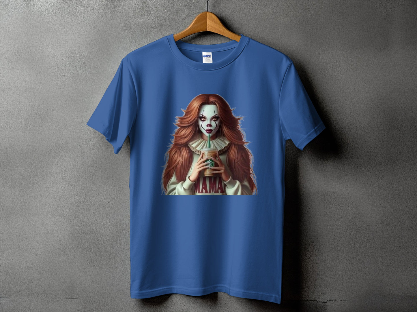 Blue t-shirt with clown graphic holding Starbucks cup, wearing a white ruffled collar, and "MAMA" text.
