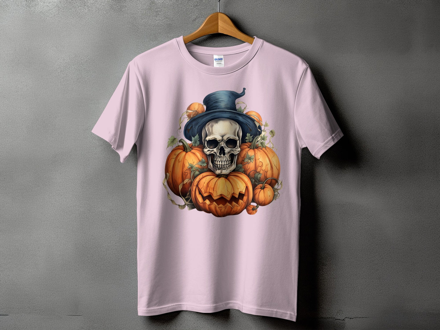 T-shirt with Halloween skull, pumpkins, and witch hat graphic.