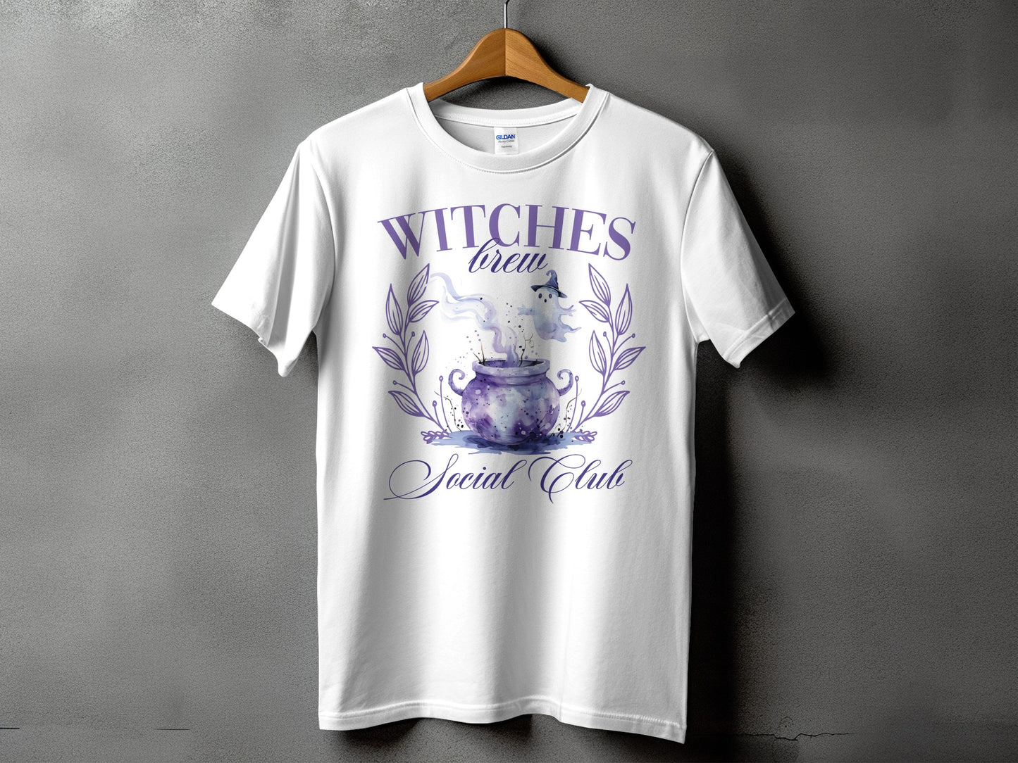White t-shirt with purple text and graphics: "Witches brew" and "Social Club"