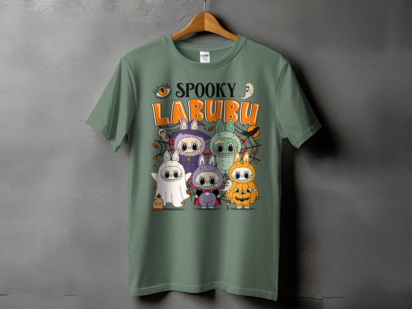 Spooky Labubu graphic with Halloween characters and text on a green t-shirt.