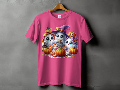 Pink t-shirt with three cartoon ghosts and pumpkins in a tea party scene.