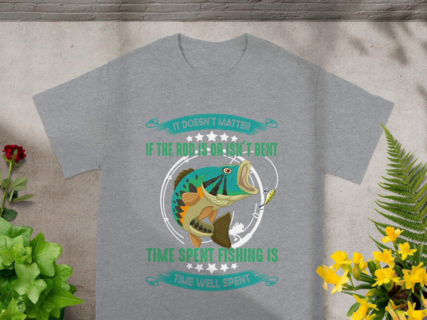 Grey t-shirt with a fish jumping for a lure and text "It doesn't matter if the rod is bent, time spent fishing is time well spent."