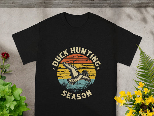 Black t-shirt with "Duck Hunting Season" text and a stylized duck.