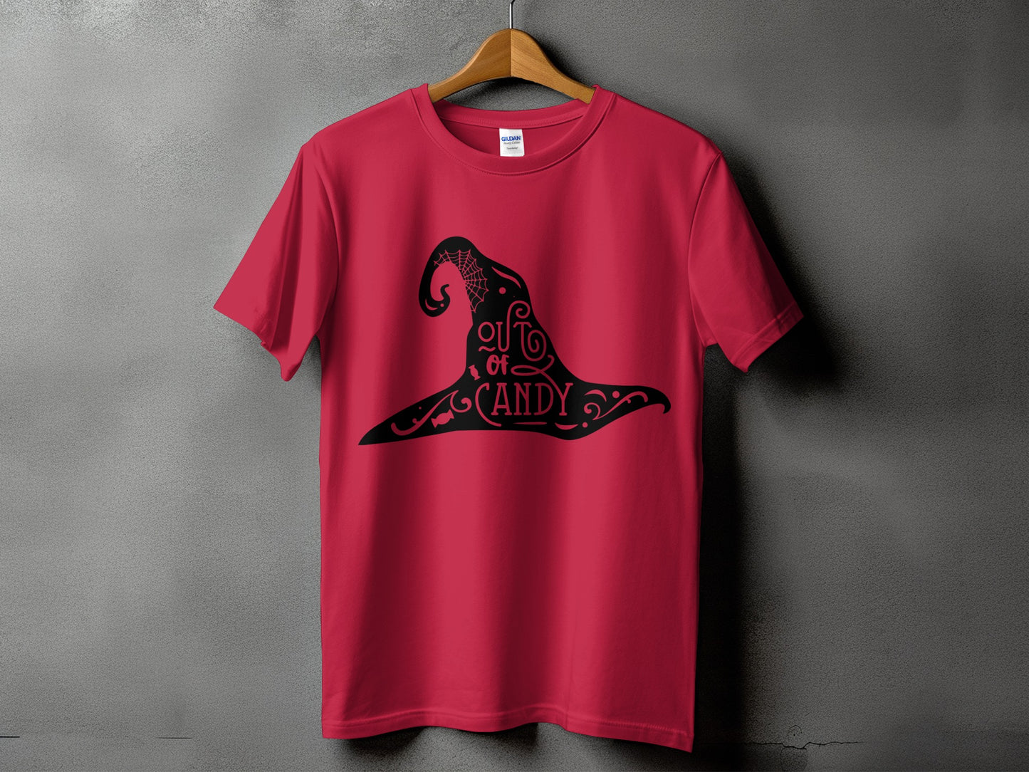 Red t-shirt with black witch hat graphic that reads "Out of Candy".