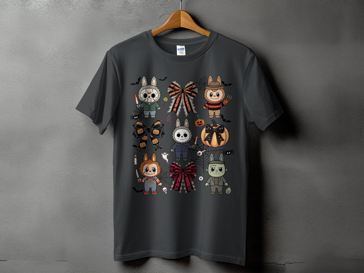 Dark gray t-shirt with a collage of Halloween horror characters depicted as cute bunnies.