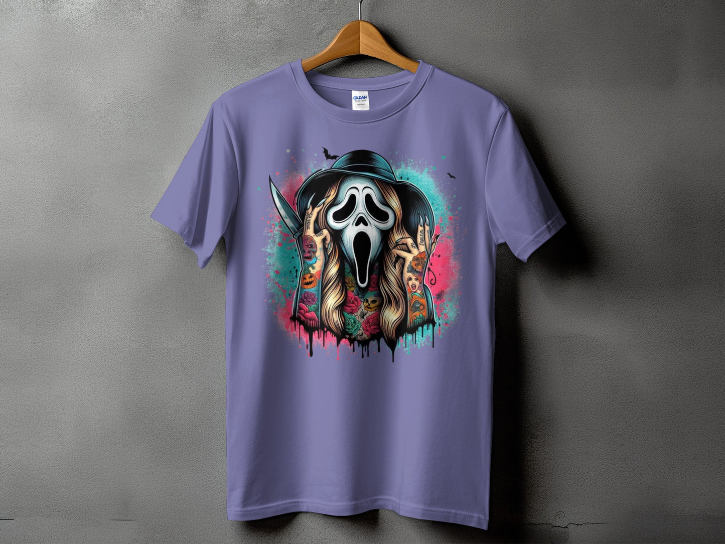 Purple t-shirt with a scream mask graphic with colorful tattoos and Halloween imagery.