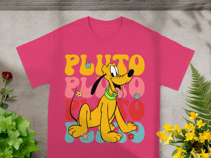 Pink t-shirt with Pluto illustration and "PLUTO" text in colorful retro lettering.