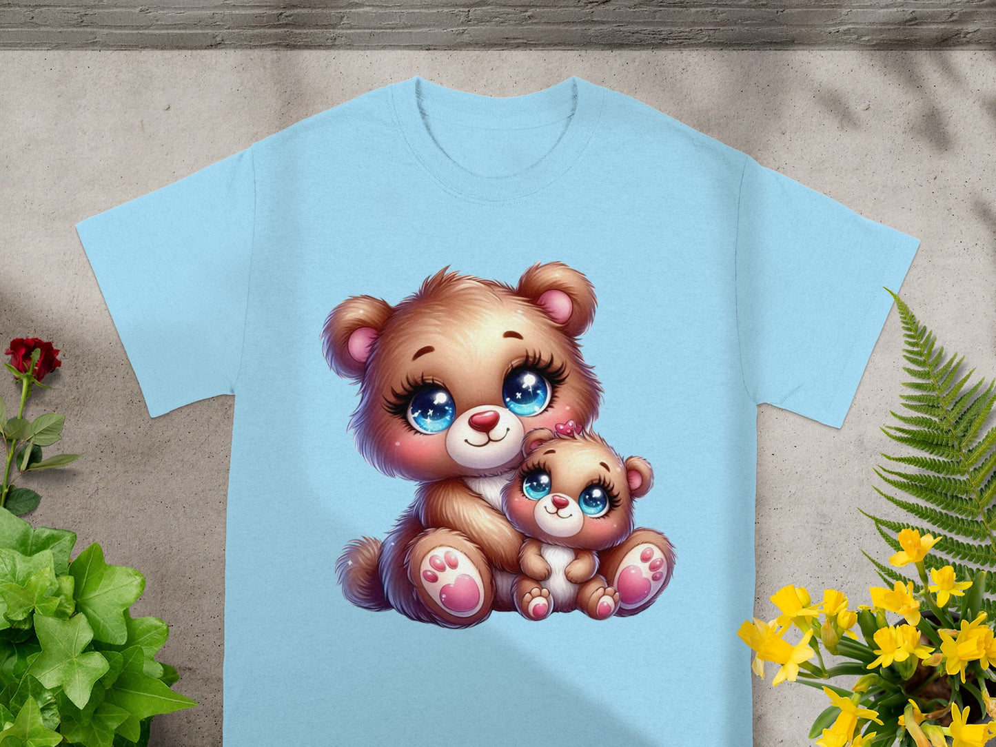 Light blue t-shirt with a cartoon of two brown teddy bears.