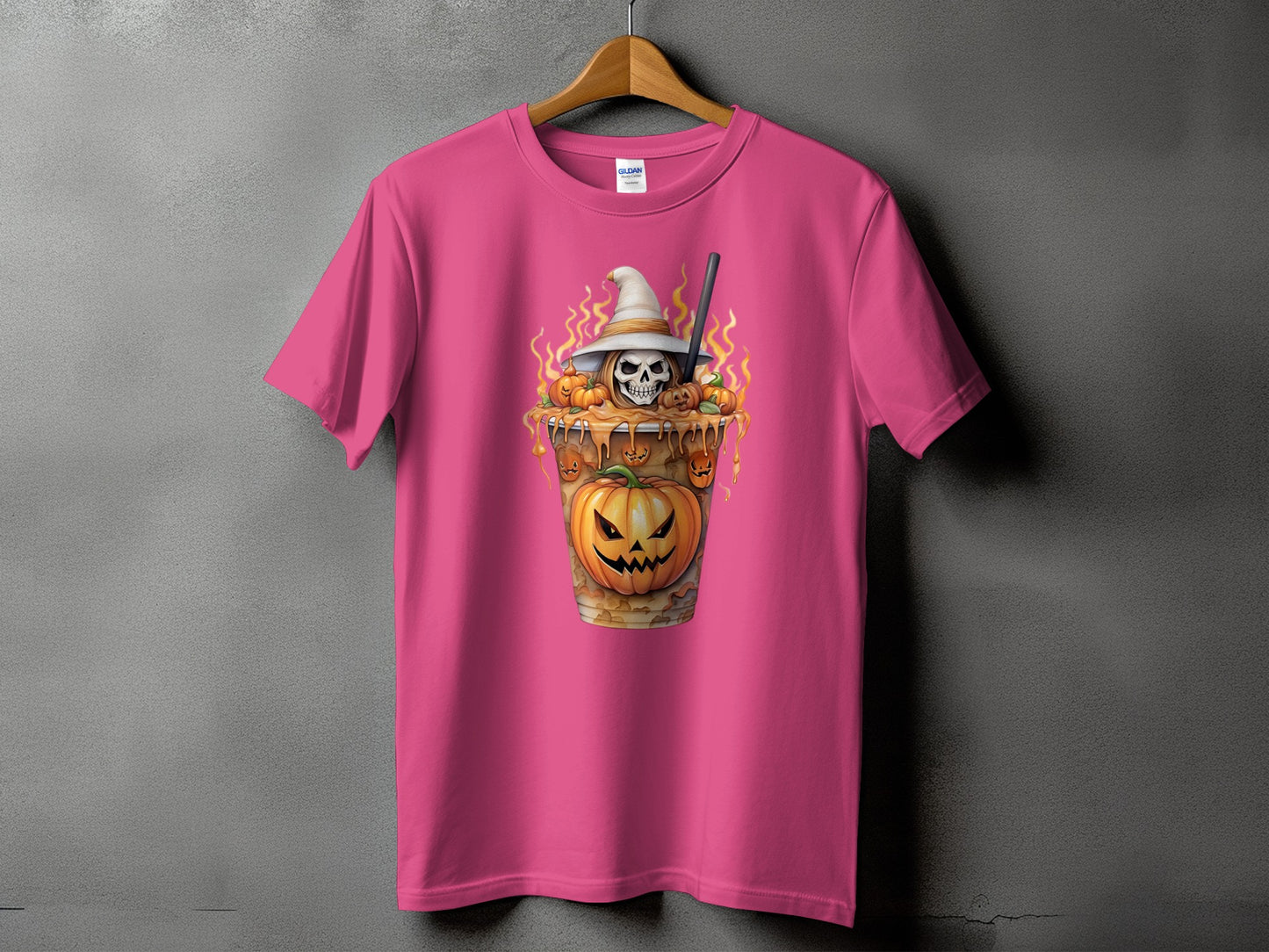 Pink t-shirt with a Halloween-themed coffee cup graphic featuring a skull and pumpkin.