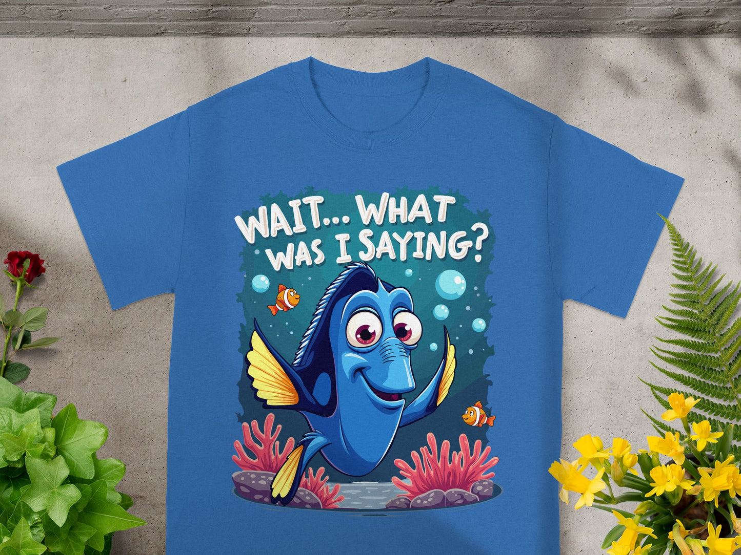 Blue t-shirt with Dory from Finding Nemo saying "WAIT... WHAT WAS I SAYING?".