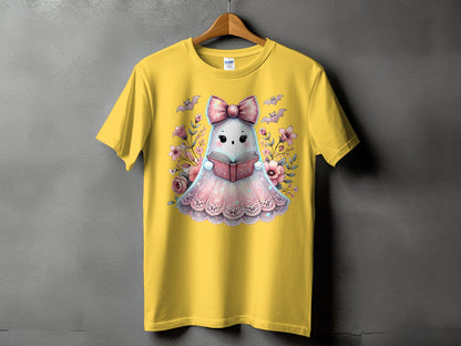 Yellow t-shirt with cute ghost reading a book surrounded by flowers and bats.