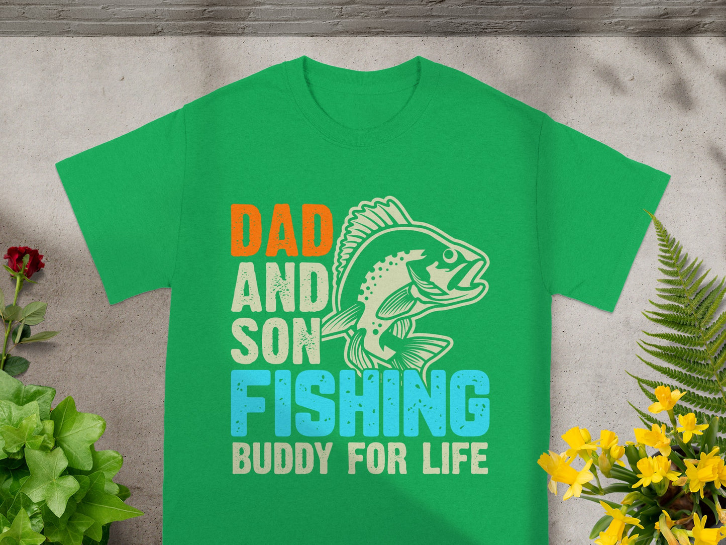 Green t-shirt with "Dad and Son Fishing Buddy For Life" text and a fish graphic.