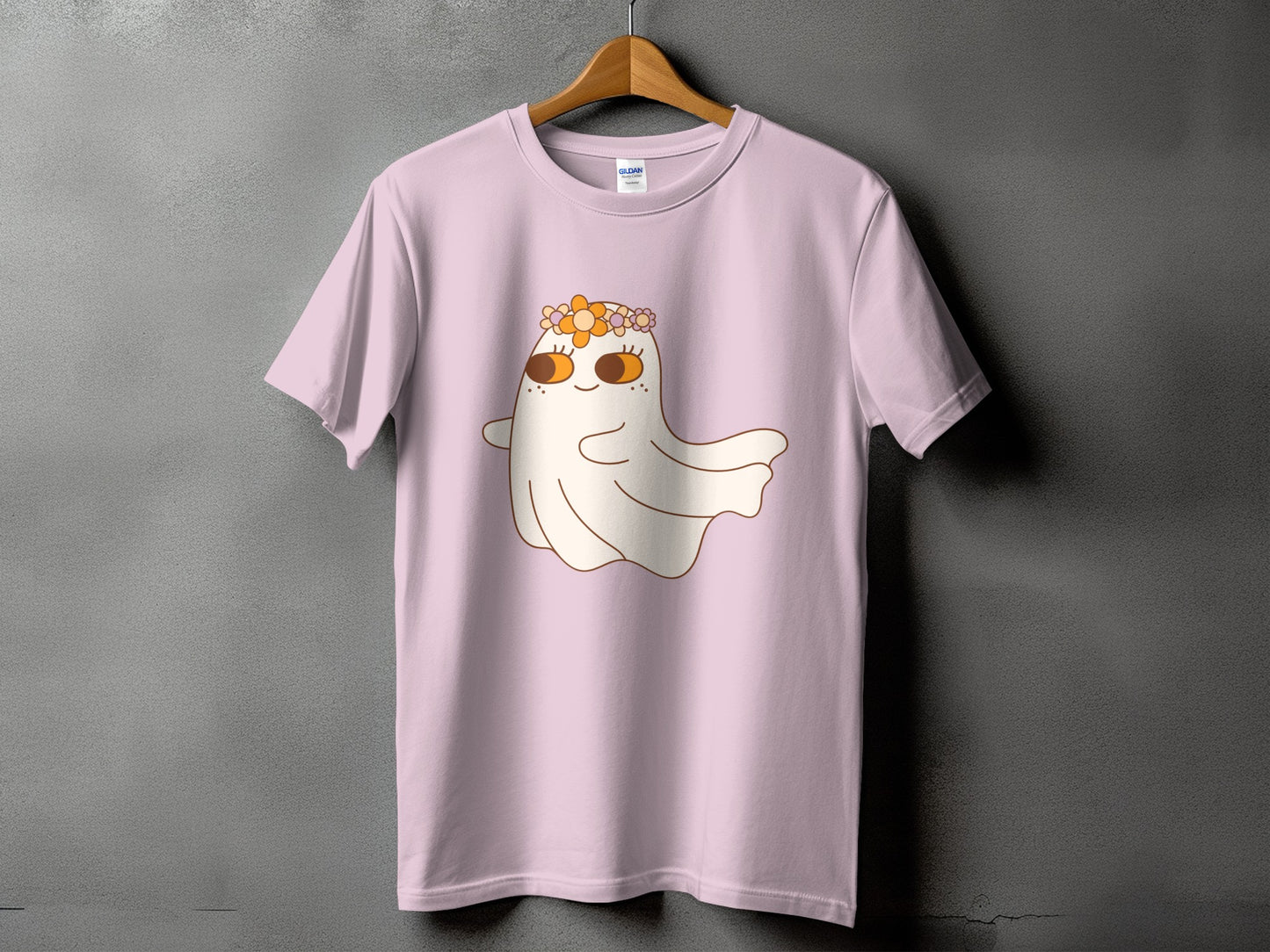 Pink t-shirt with a cartoon ghost wearing a flower crown.