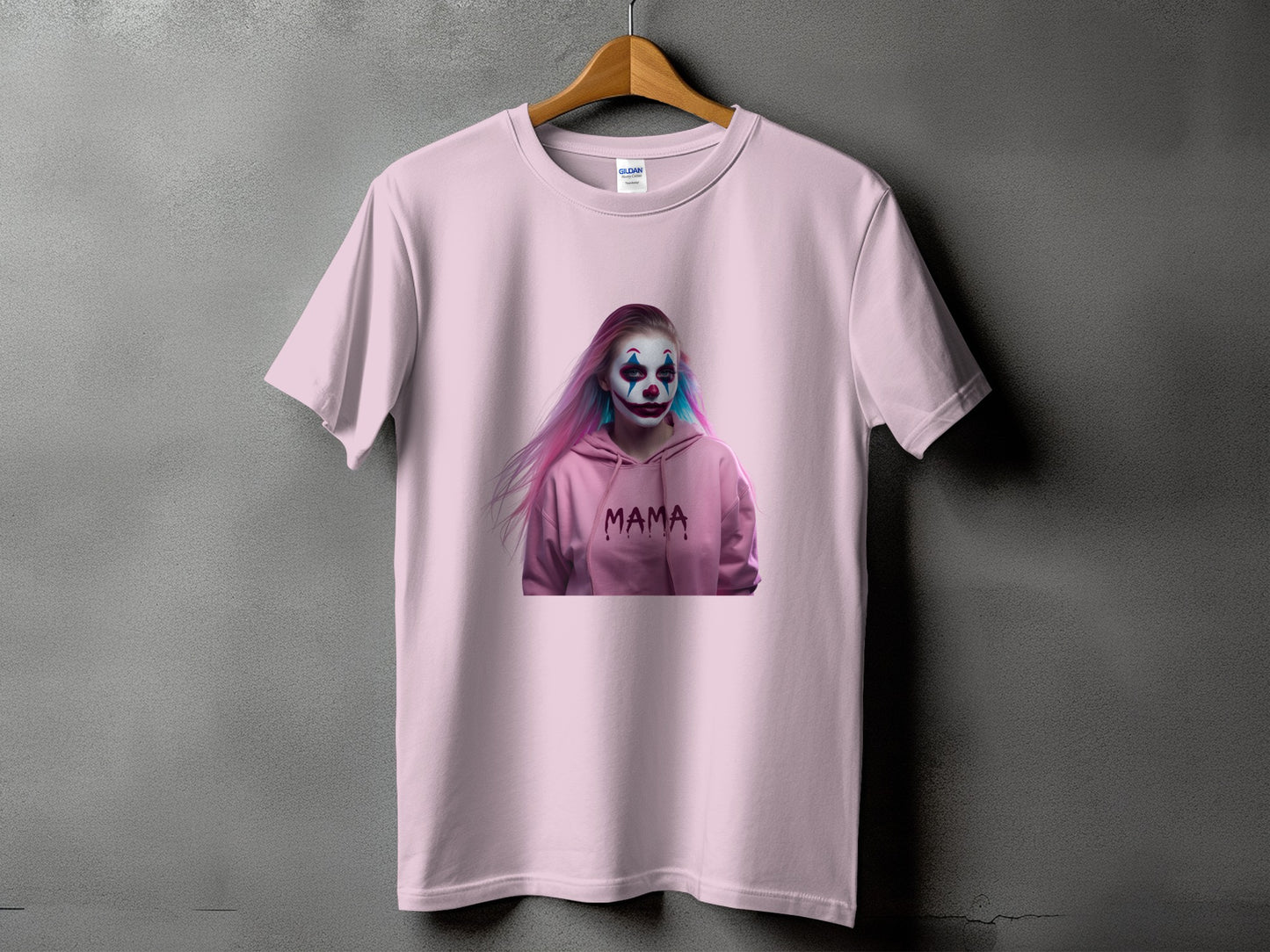 Pink t-shirt with a graphic of a person in clown makeup and pink/blue hair.