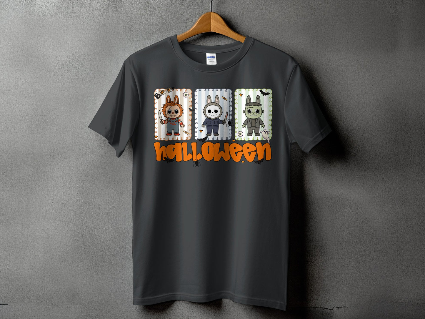 Dark grey t-shirt with Halloween graphic featuring three cartoon characters and text.
