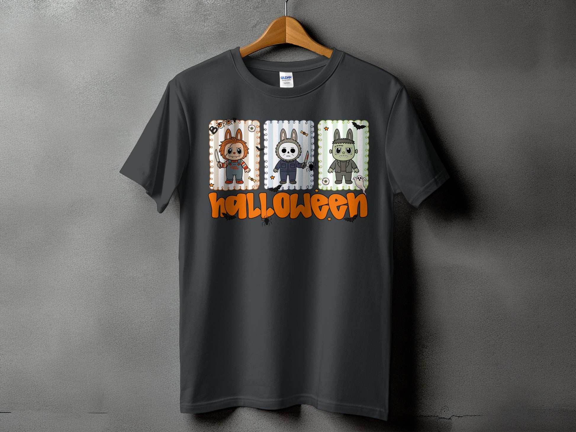 Dark grey t-shirt with Halloween graphic featuring three cartoon characters and text.