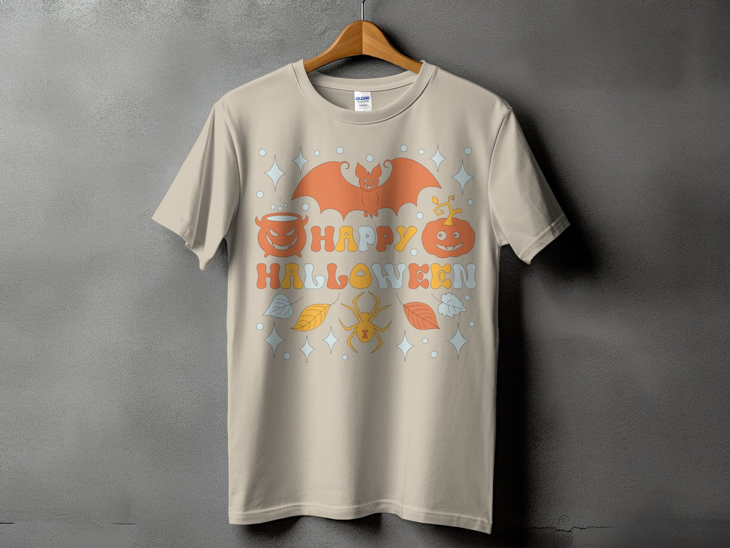 T-shirt with "Happy Halloween" text, bat, pumpkin, cauldron, and spider graphic.
