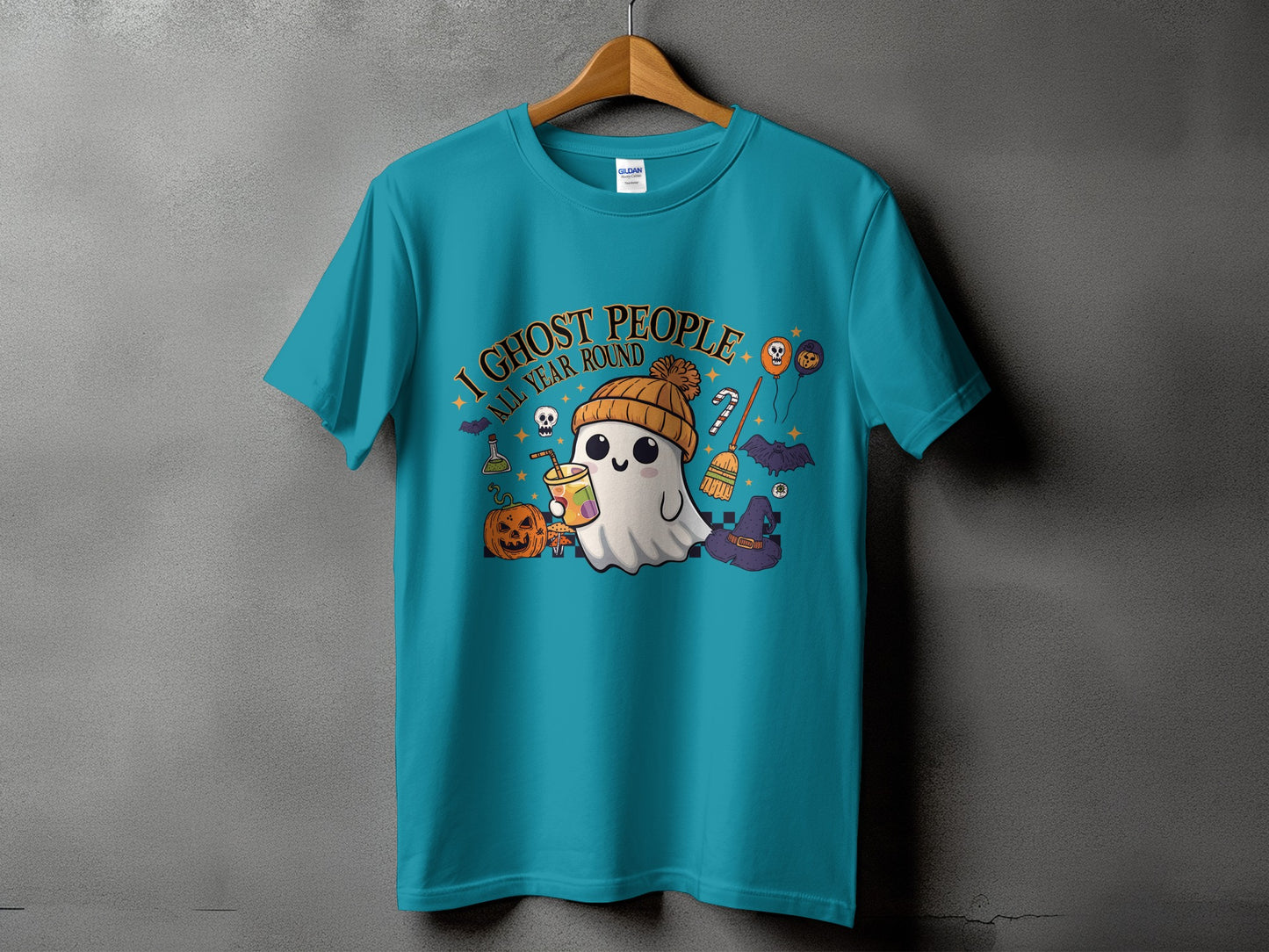 Teal t-shirt with a ghost graphic that says "I Ghost People All Year Round."