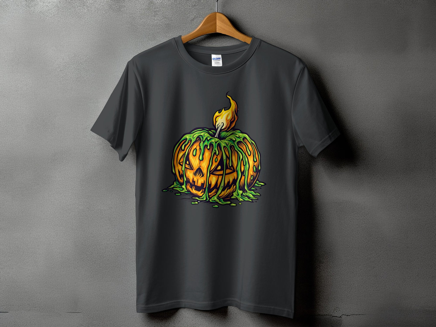 Dark grey t-shirt with a green slime dripping, jack-o'-lantern design and a flame.