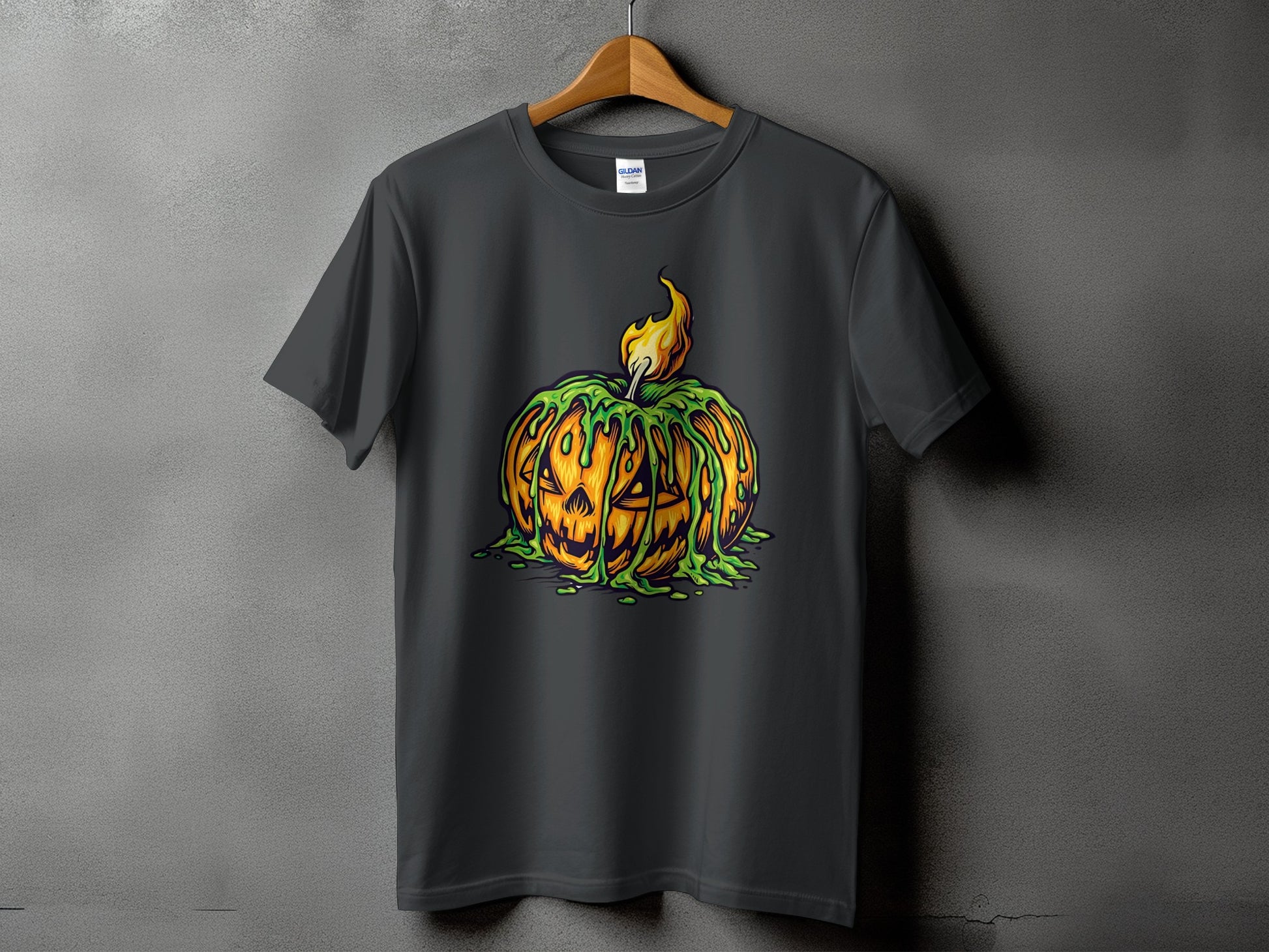 Dark grey t-shirt with a green slime dripping, jack-o'-lantern design and a flame.