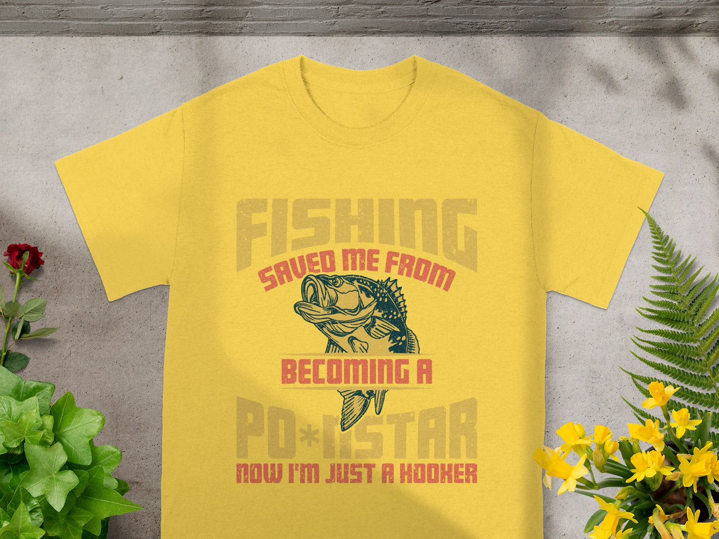 Yellow t-shirt with graphic: Fishing saved me from becoming a PO*STAR now I'm just a hooker.