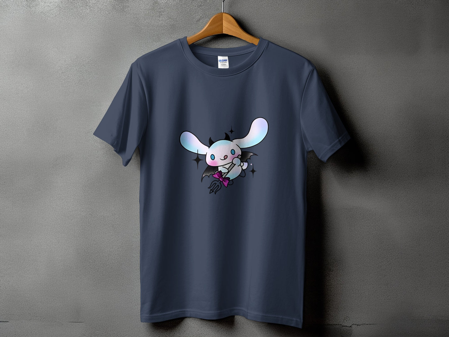 Dark blue t-shirt with a cartoon character graphic of a white bunny with bat wings.