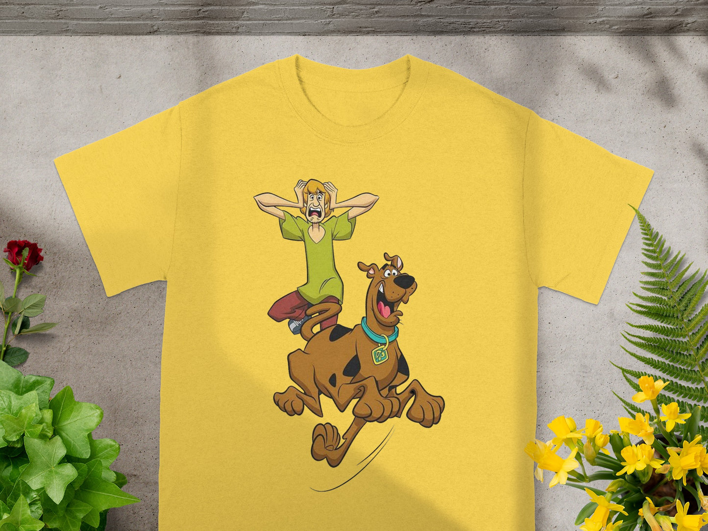 Yellow t-shirt with Scooby-Doo and Shaggy cartoon characters.