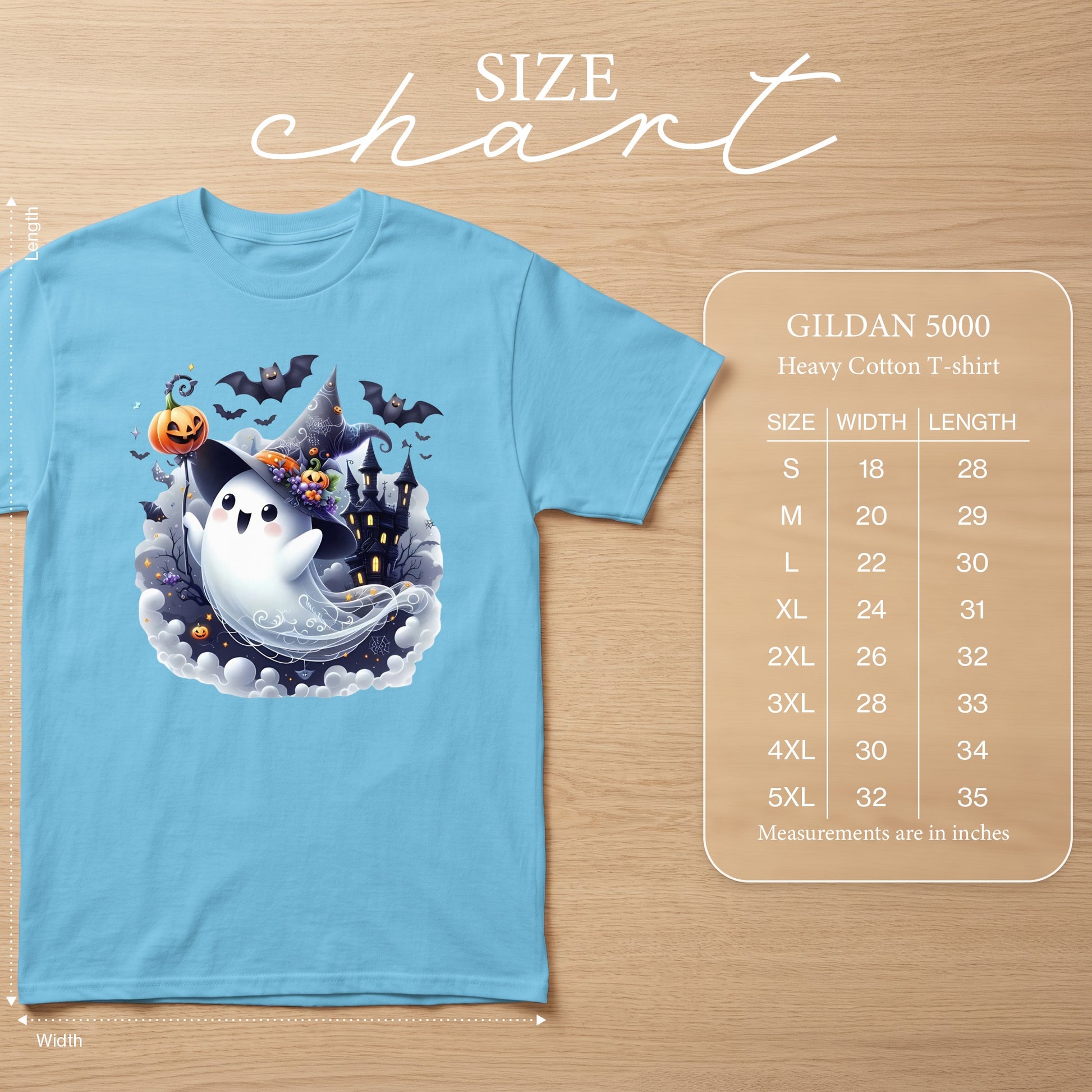 Light blue Gildan 5000 heavy cotton t-shirt with Halloween ghost graphic and size chart.