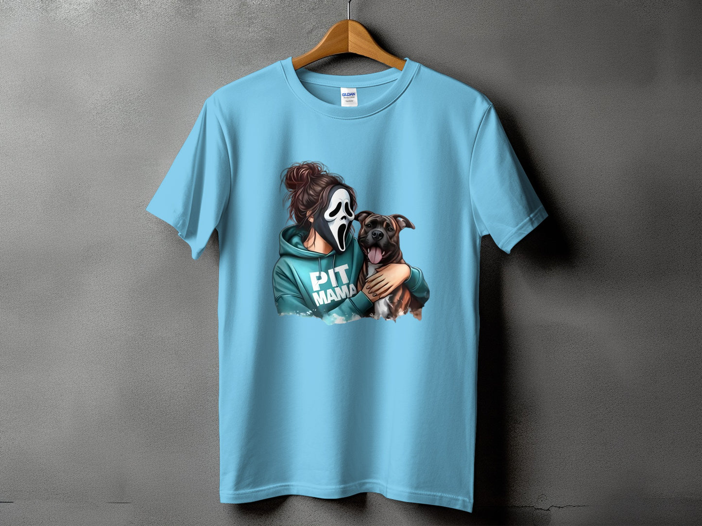 Blue t-shirt with graphic of person in Scream mask hugging a pit bull dog.