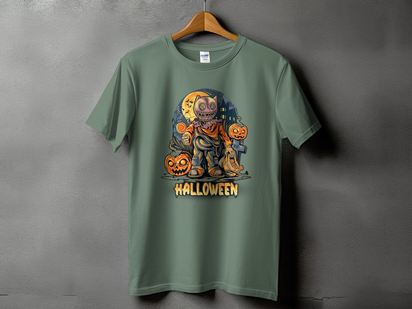 Green t-shirt with a Halloween graphic featuring a scarecrow, pumpkins, and the word "HALLOWEEN".