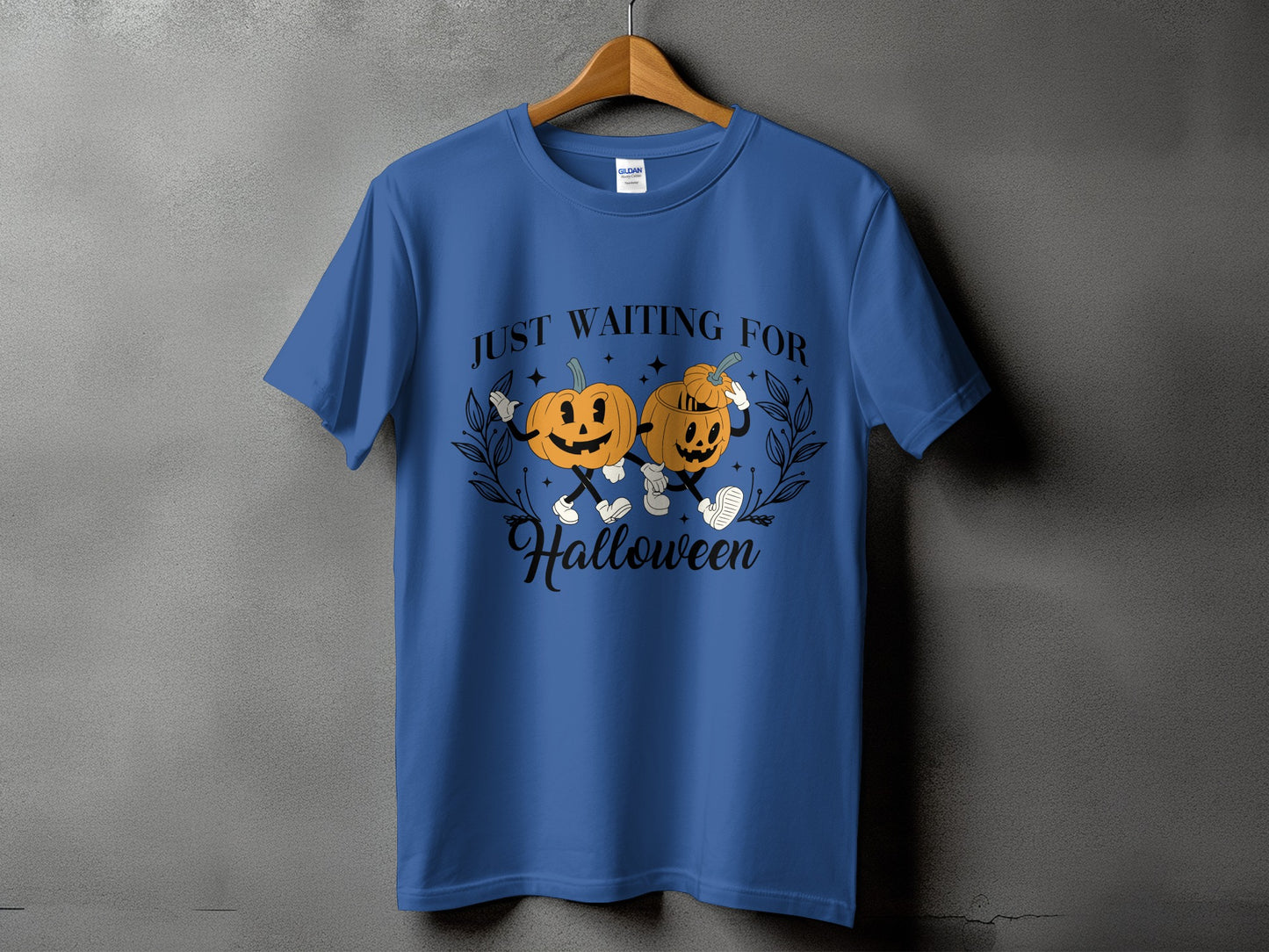 Blue t-shirt with pumpkins and the text "JUST WAITING FOR Halloween".