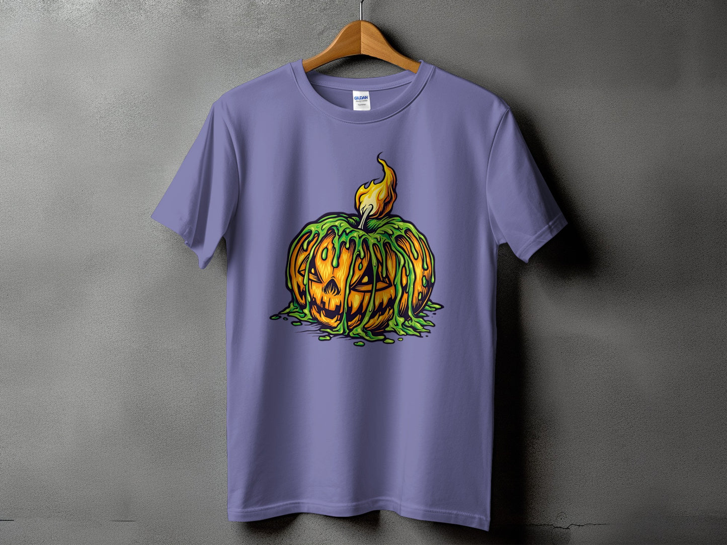 Purple t-shirt with a carved pumpkin graphic dripping green slime and a flame.