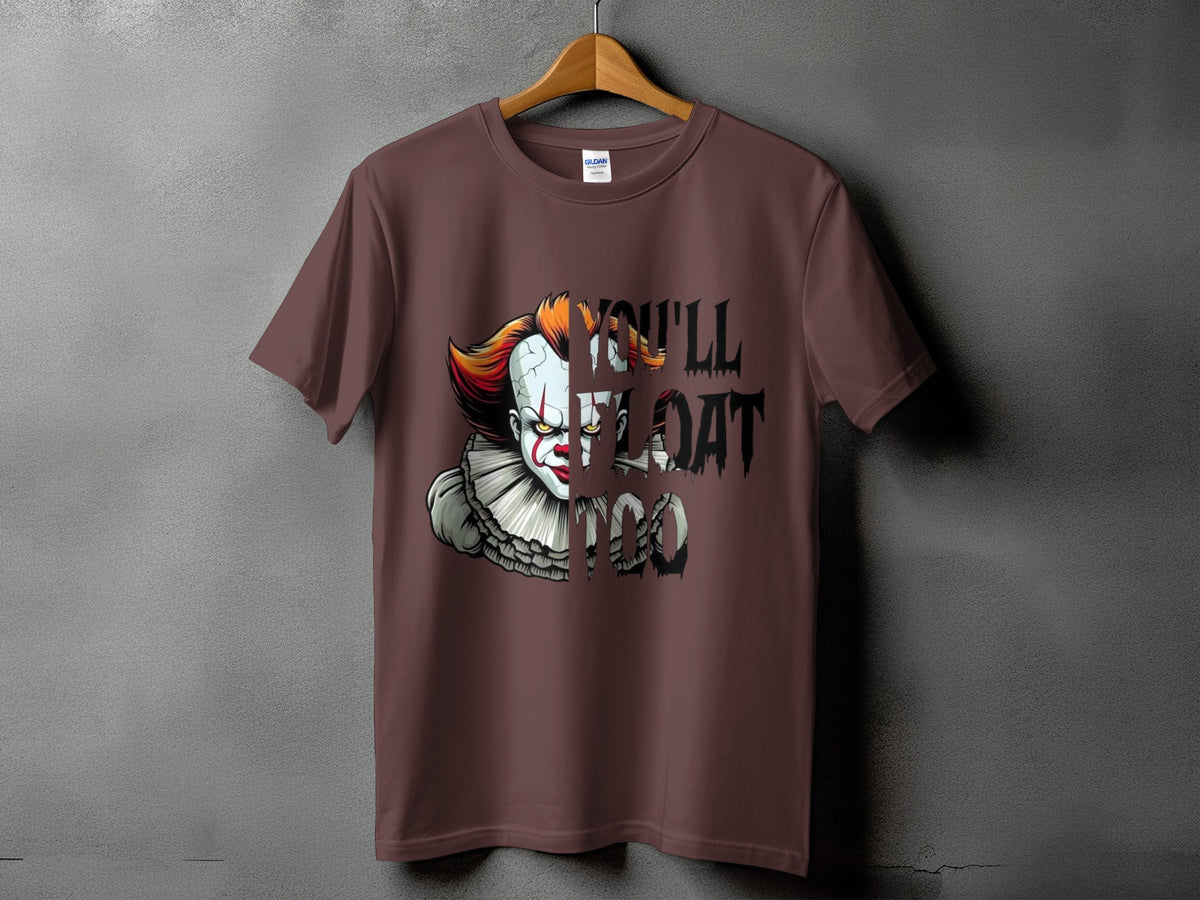 Brown t-shirt with graphic of Pennywise the Clown and text "YOU'LL FLOAT TOO".