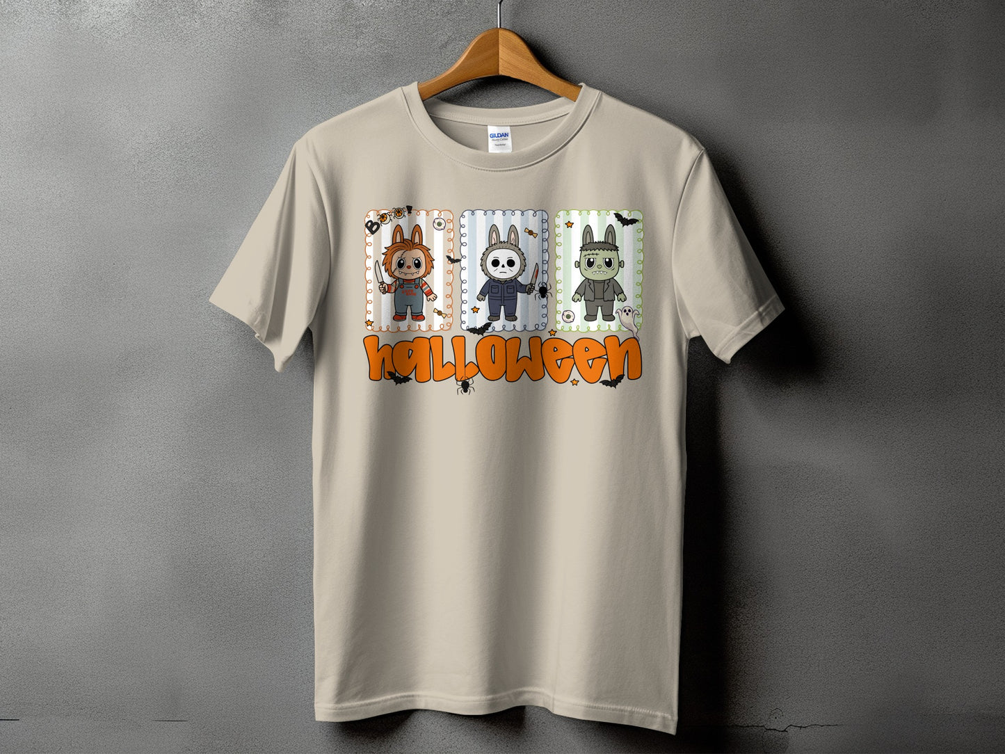 T-shirt with Halloween design featuring Chucky, Michael Myers, and Frankenstein characters.
