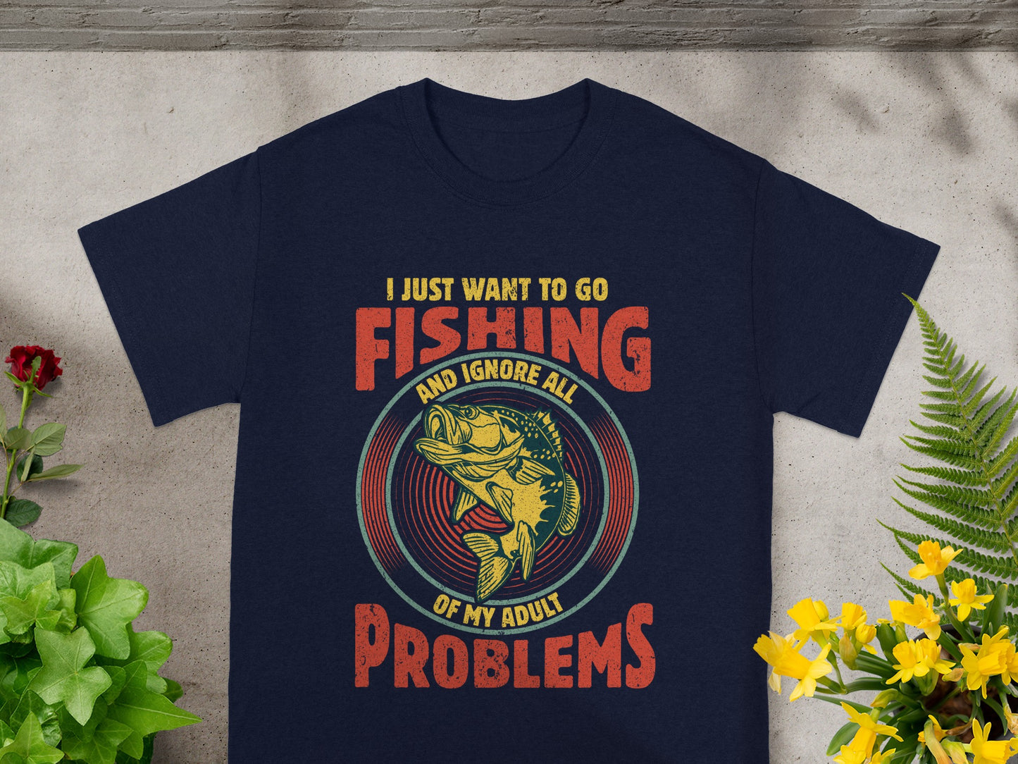 Navy t-shirt with distressed graphic: "I just want to go fishing and ignore all of my adult problems."