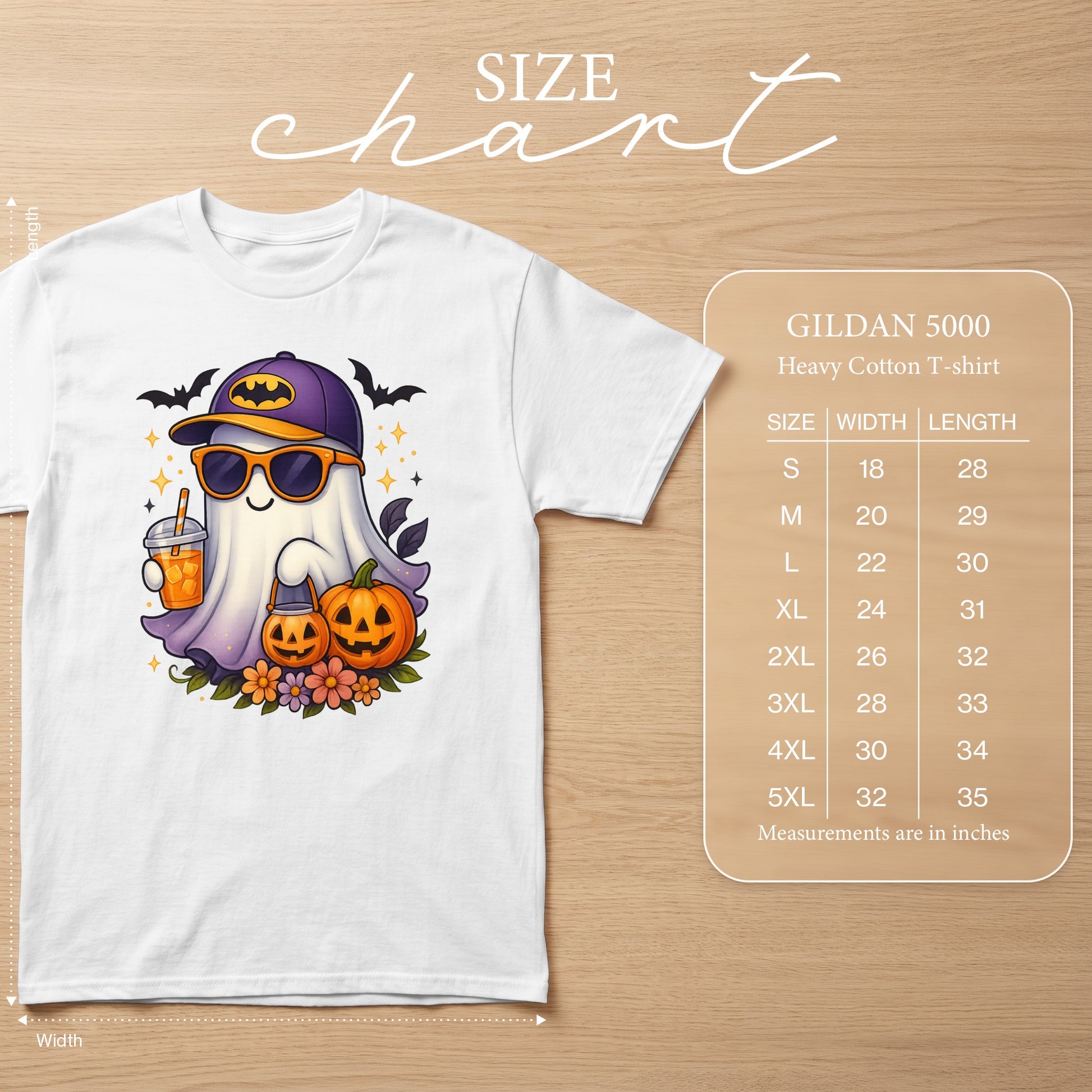 White t-shirt with cartoon ghost wearing Batman hat, sunglasses, holding drink, pumpkins, and flowers. Includes size chart.