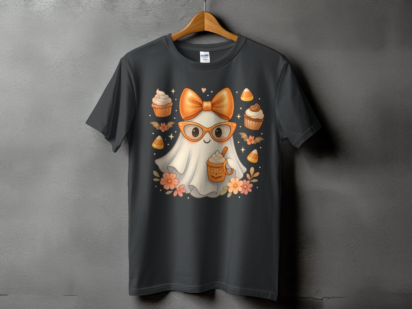 Ghost with orange glasses, bow, and pumpkin spice latte on a t-shirt.