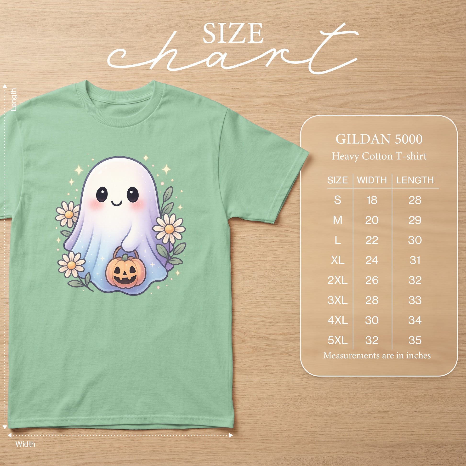 Light green t-shirt with a cute ghost holding a pumpkin, with size chart.
